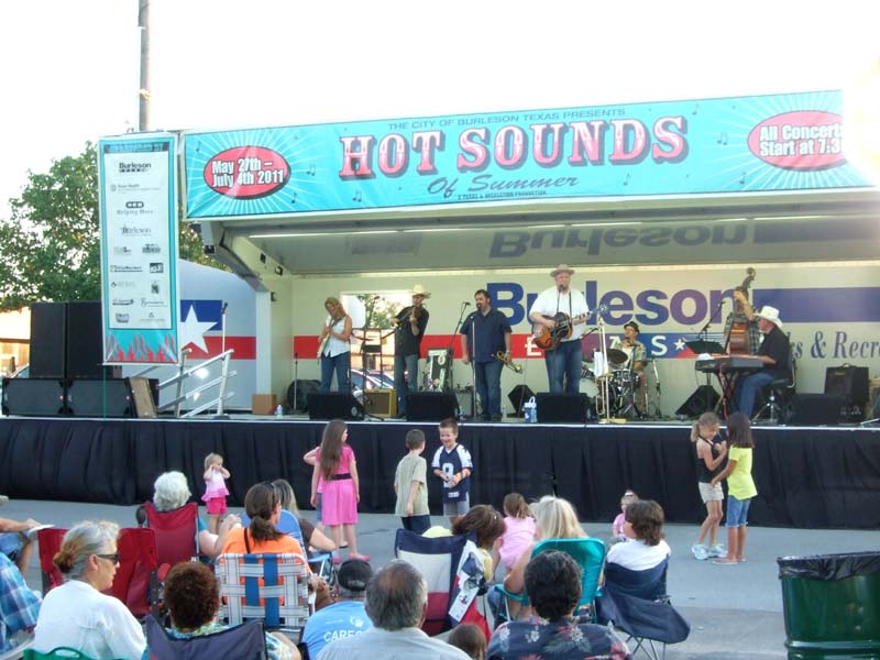 Photo of band and audience members